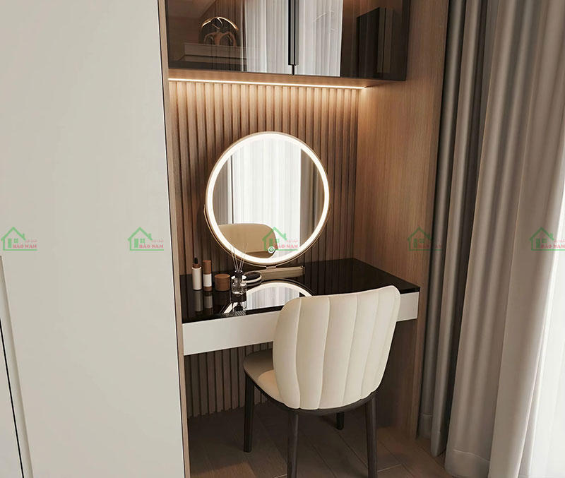 Bàn trang điểm nhỏ gọn với gương tròn viền đèn LED, tạo điểm nhấn sang trọng và tiện nghi cho phòng ngủ.
