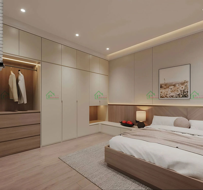 Phòng ngủ hiện đại với tủ quần áo âm tường, giường ngủ thấp và đầu giường ốp gỗ, tối ưu không gian và tạo vẻ đẹp tinh tế.