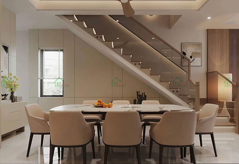 Phòng ăn hiện đại với bàn ăn đá marble và 6 ghế ngồi màu kem, tạo không gian sang trọng và ấm cúng