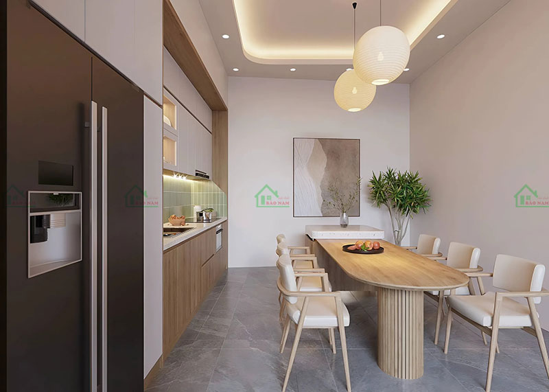 Bàn ăn gỗ tự nhiên hình chữ nhật kết hợp với ghế ngồi màu kem, tạo điểm nhấn cho không gian phòng bếp hiện đại.