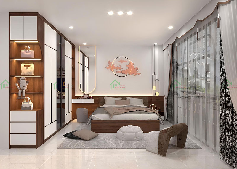 Phòng ngủ với điểm nhấn nghệ thuật độc đáo, bao gồm tranh treo tường và đồ decor, thể hiện cá tính của gia chủ.